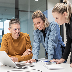 Three colleagues in a meeting